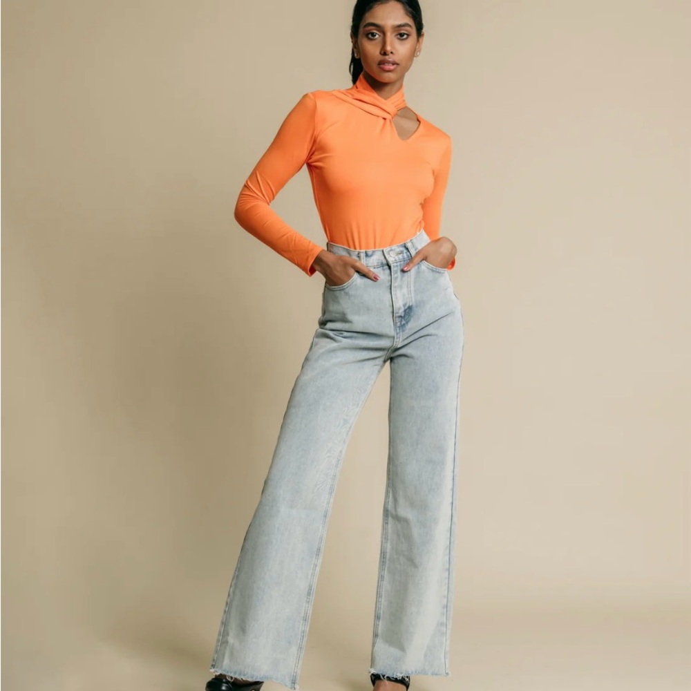 Orange turtleneck with cut out